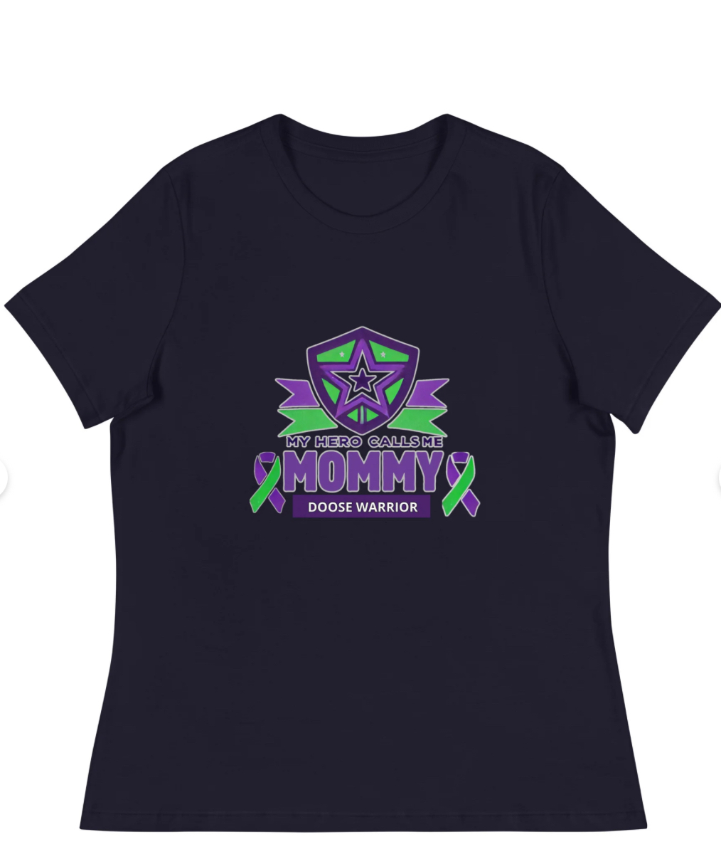 Black Shirt with purple rectangle having a green word saying Million but the i before the o is a larger white number 1 so it says 1 in a million Doose Syndrome